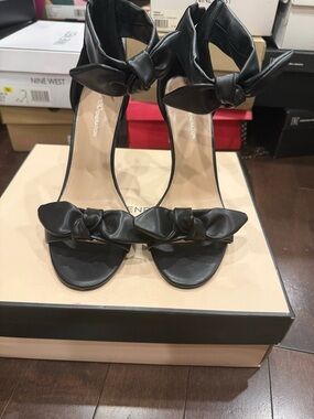 BCBGeneration Black Bow-Ankle Strap Heels